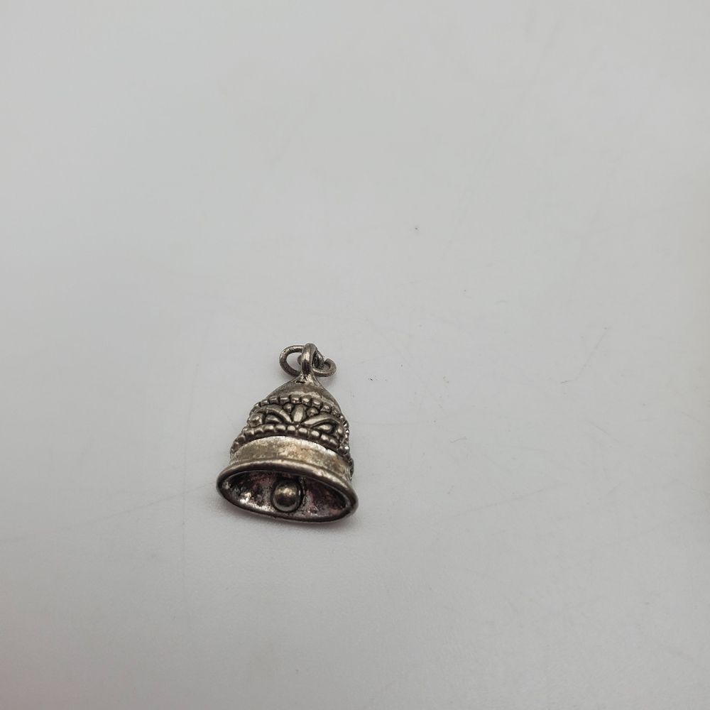 Silver toned bell pendant‎